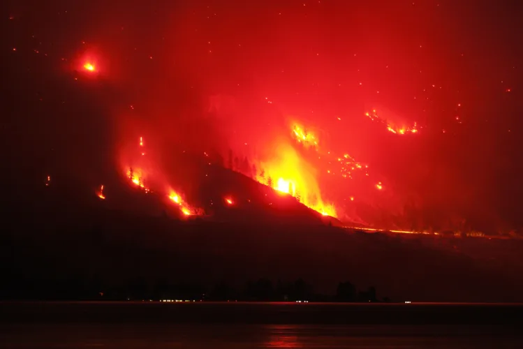 Wildfires burn across western US and Canada as residents are evacuated